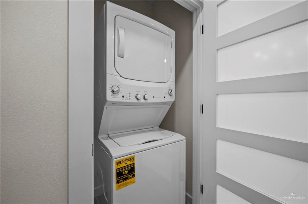 2709 Mockingbird Road, Unit 2 Weslaco, TX 78596 - Photo 13 of 20 a utility room with dryer and washer