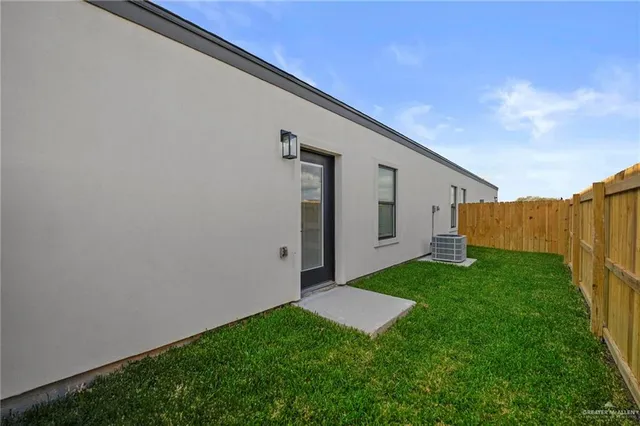 a view of backyard with hardwood