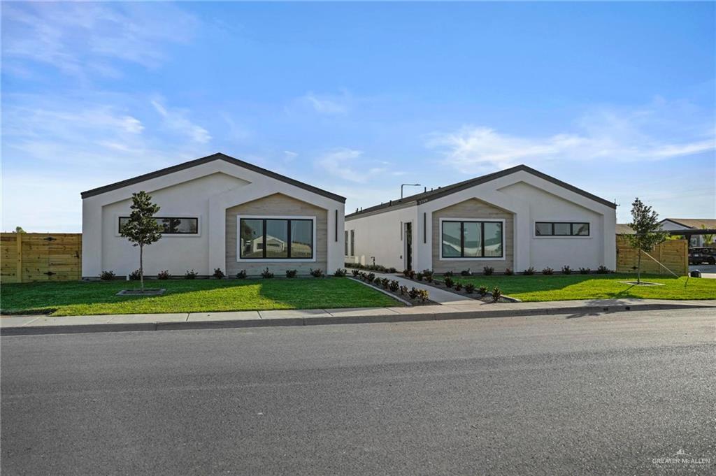 2709 Mockingbird Road, Unit 2 Weslaco, TX 78596 - Photo 2 of 20 a view of house with outdoor space and street view
