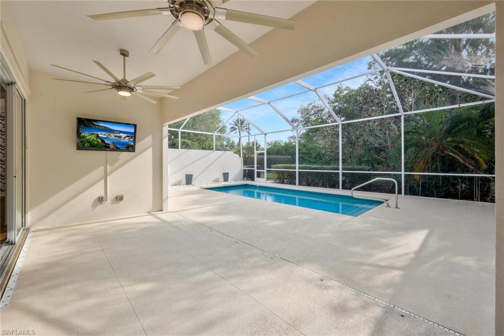 6044 Andros Way Naples, FL 34119 - Photo 24 of 46 Pool with ceiling fan, a lanai, and a patio area