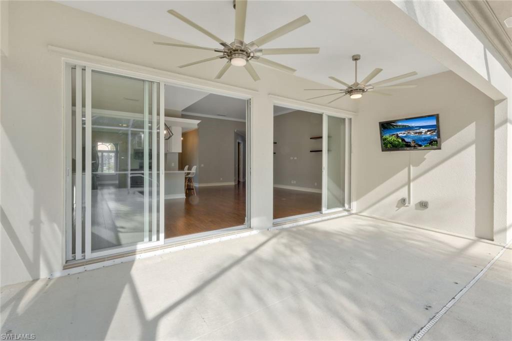6044 Andros Way Naples, FL 34119 - Photo 25 of 46 View of patio / terrace with a ceiling fan