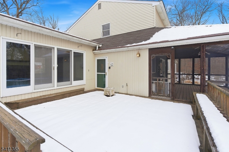 439 Long Hill Road Hillsborough, NJ 08844 - Photo 34 of 41 a view of a patio with table and chairs