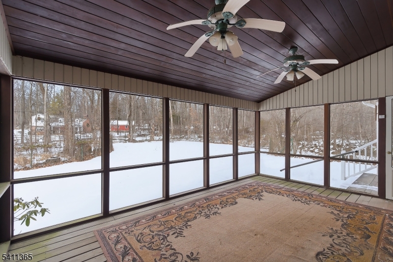 439 Long Hill Road Hillsborough, NJ 08844 - Photo 6 of 41 a view of a livingroom with a ceiling fan and window