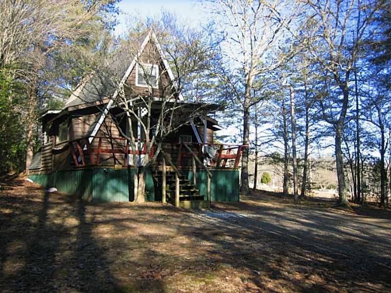 44 Loving Road Blairsville, GA 30512 - Photo 1 of 1 Exterior Front. Adorable A-Frame with peaceful views. The home needs some TLC, but has great bones. Roof is 3 years old. The property is close to lakes, hiking, shopping & dining.