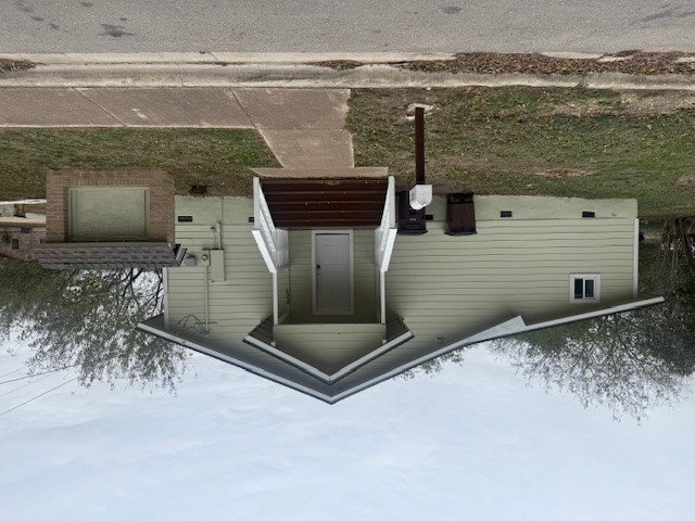 823 Monterrey Street Lockhart, TX 78644 - Photo 2 of 14 a front view of a house with garden