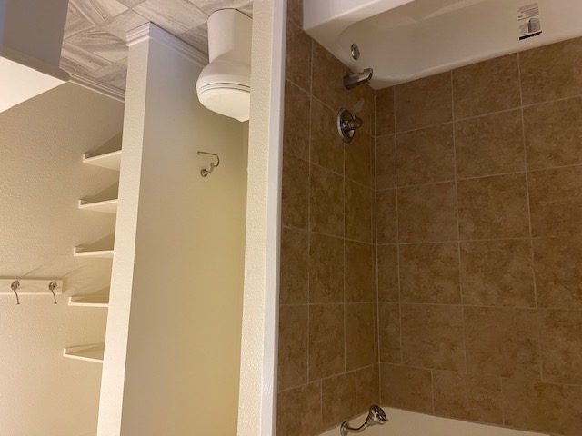 823 Monterrey Street Lockhart, TX 78644 - Photo 6 of 14 a bathroom with a toilet and shower