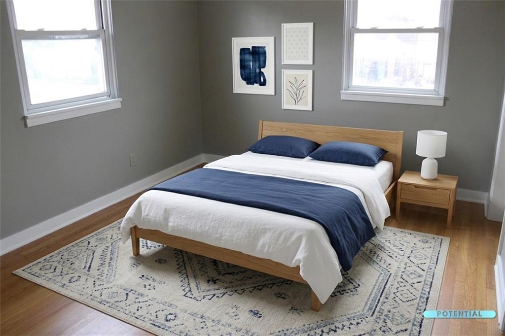 825 Liberty Street Duquesne, PA 15110 - Photo 25 of 25 a bedroom with a bed and window