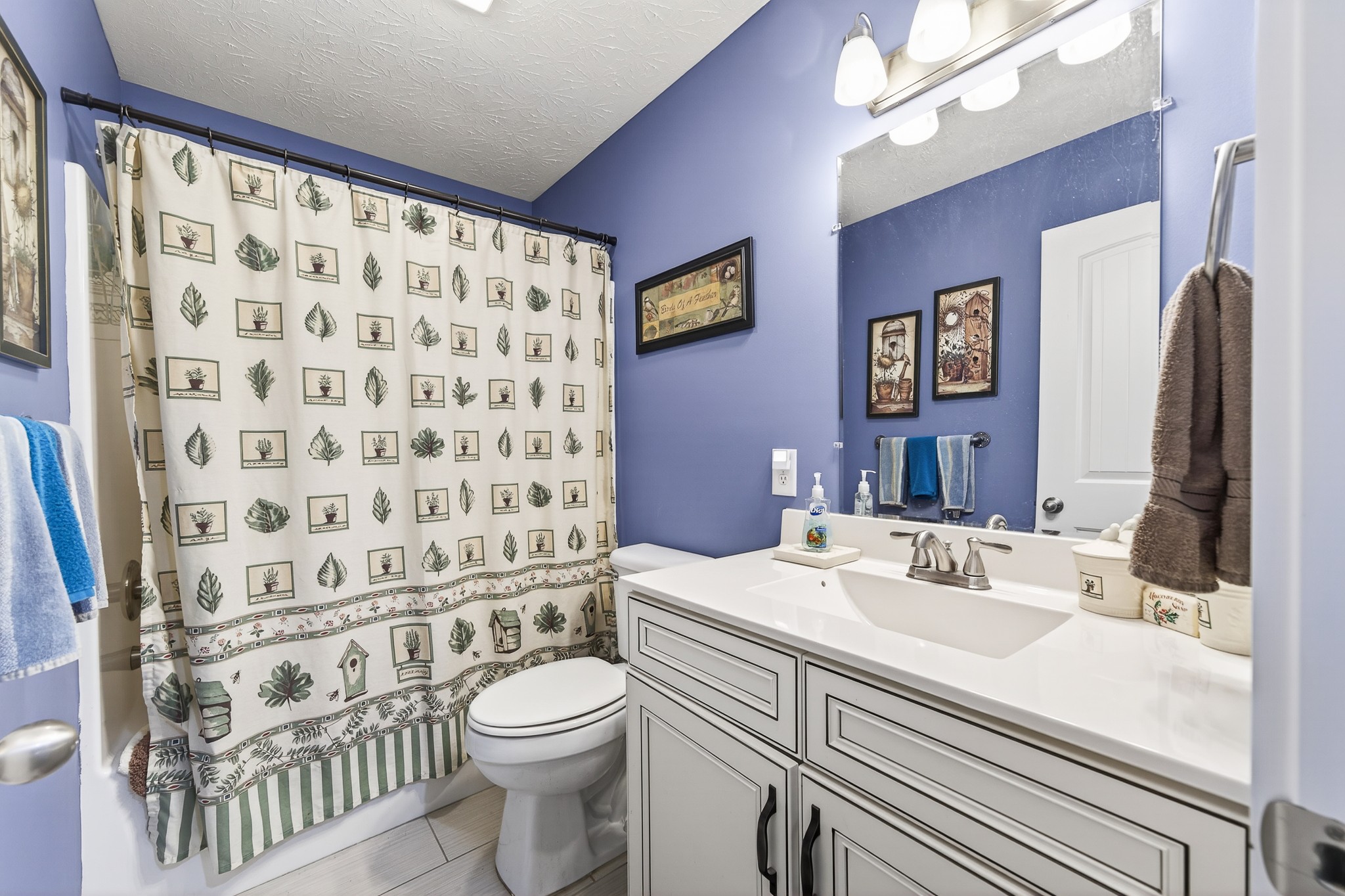 2040 Walker Cove Road Sparta, TN 38583 - Photo 15 of 26 a bathroom with a sink toilet and shower