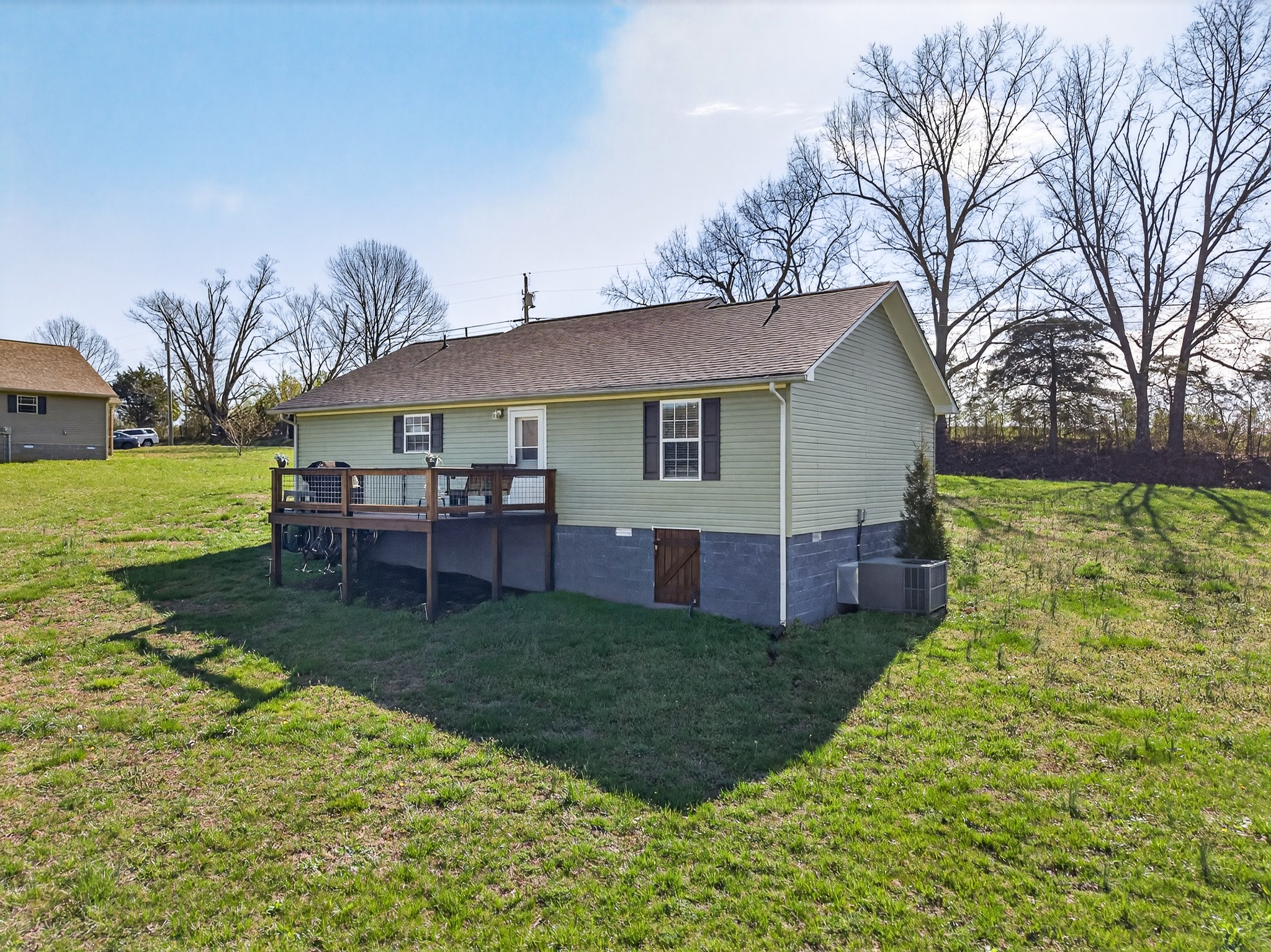 2040 Walker Cove Road Sparta, TN 38583 - Photo 19 of 26 a view of a house with a yard porch and sitting area