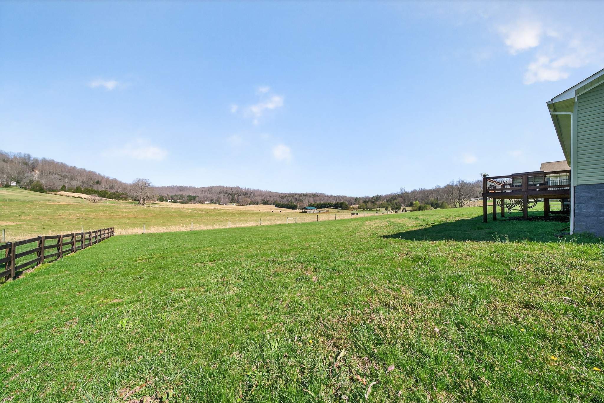2040 Walker Cove Road Sparta, TN 38583 - Photo 22 of 26 a view of a lake with a big yard