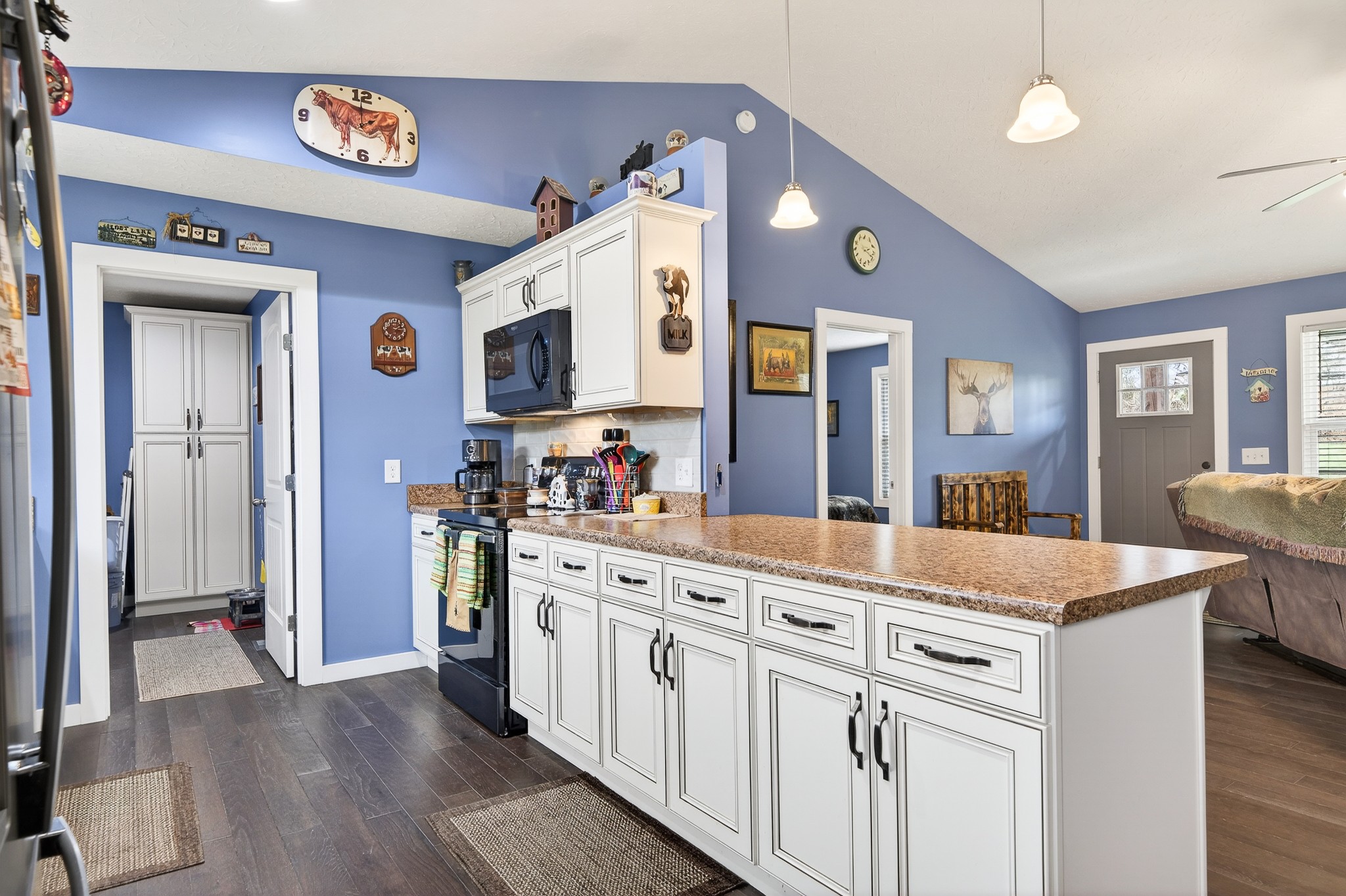 2040 Walker Cove Road Sparta, TN 38583 - Photo 9 of 26 a kitchen with cabinets and wooden floor