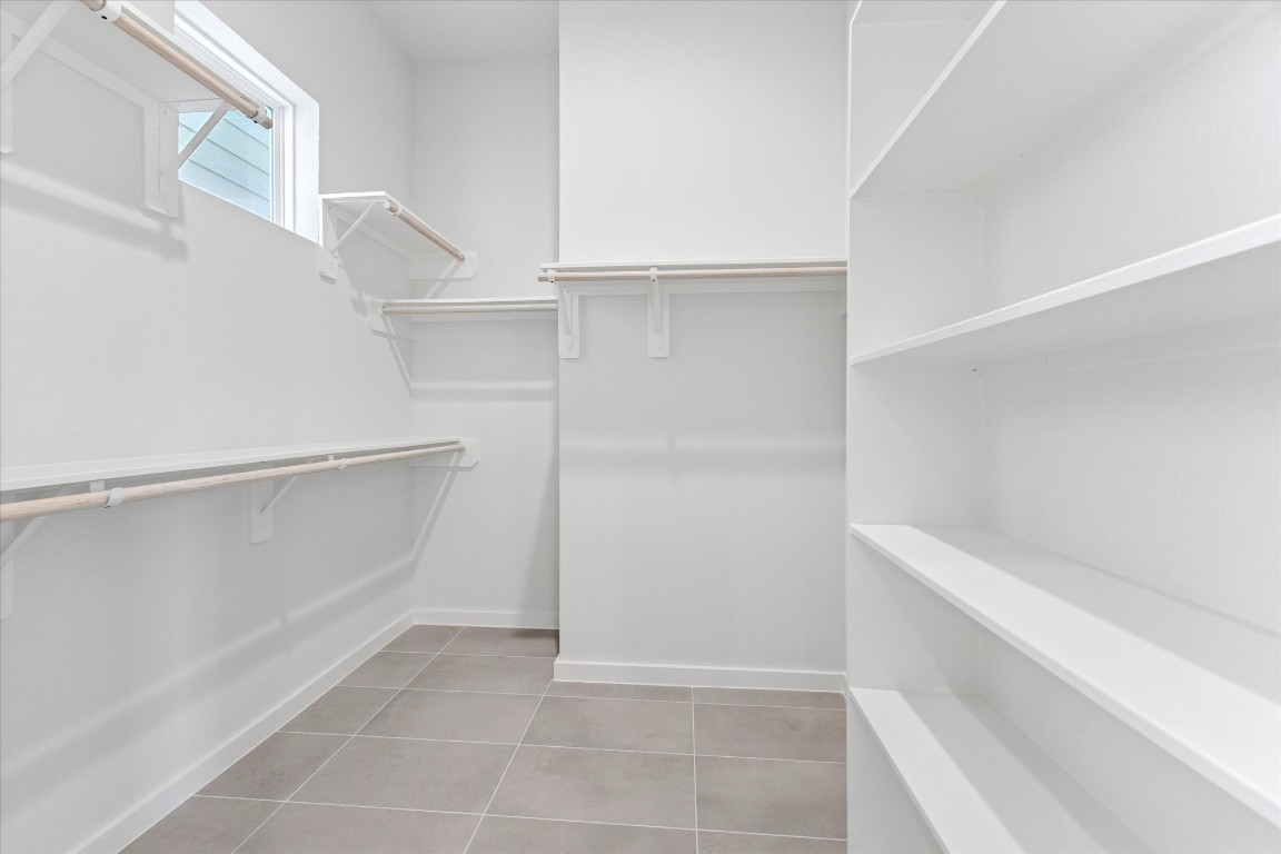 817 Thornton Road, Unit F Houston, TX 77018 - Photo 23 of 36 a view of an empty walk in closet