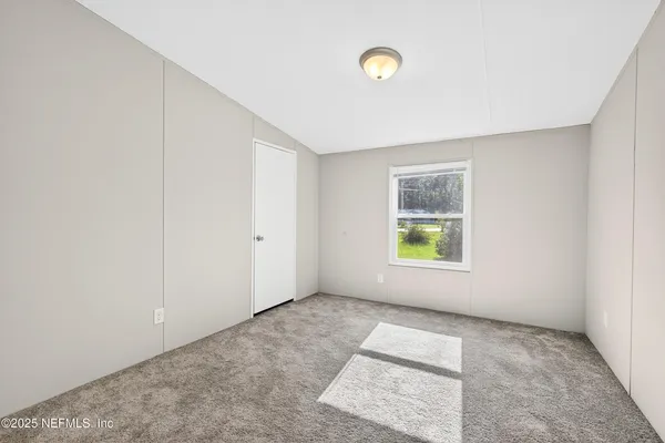 an empty room with window