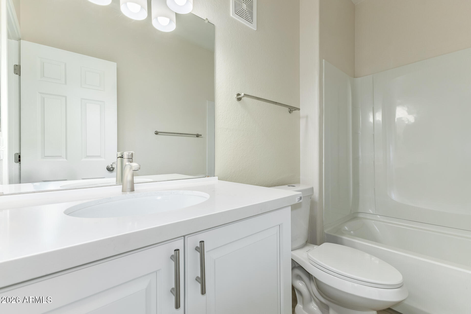 3434 East Baseline Road, Unit 109 Phoenix, AZ 85042 - Photo 24 of 40 a bathroom with a sink a toilet and shower