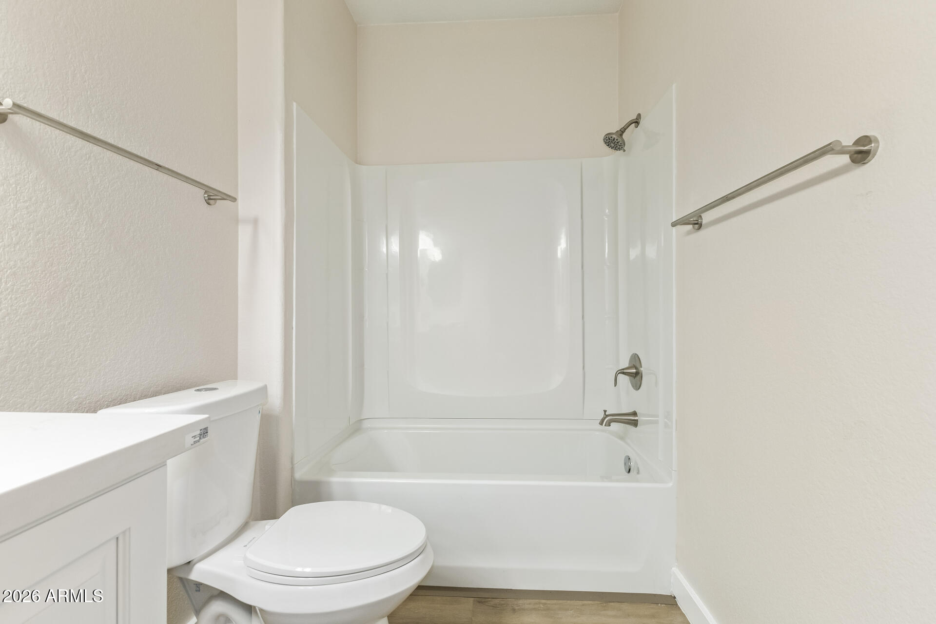 3434 East Baseline Road, Unit 109 Phoenix, AZ 85042 - Photo 25 of 40 a bathroom with a bathtub and a toilet