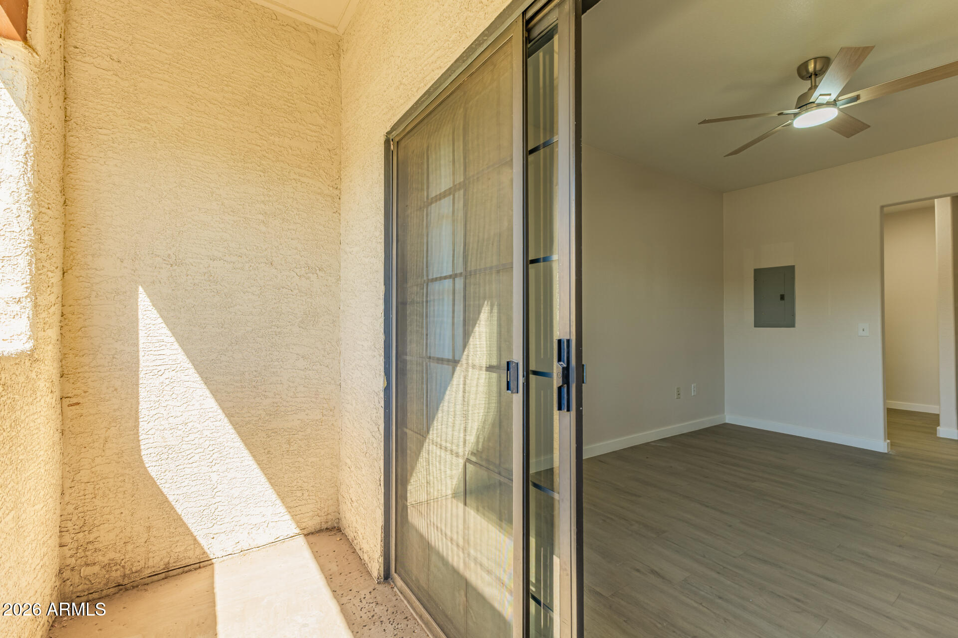 3434 East Baseline Road, Unit 109 Phoenix, AZ 85042 - Photo 29 of 40 a view of a hallway with wooden floor and staircase