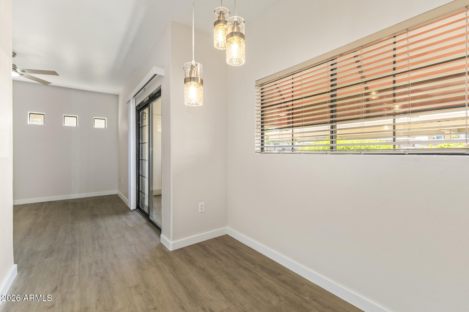 3434 East Baseline Road, Unit 109 Phoenix, AZ 85042 - Photo 9 of 40 a view of a hallway with a window