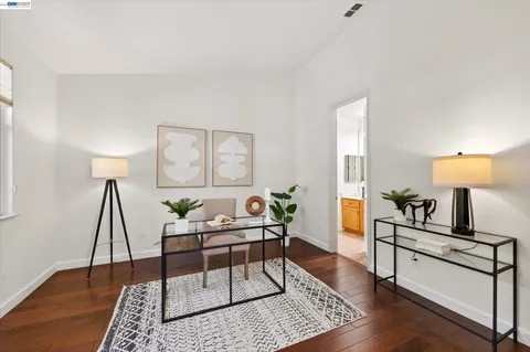 a dining room with furniture window wooden floor