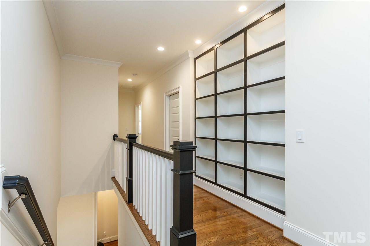 4405 Gates Street Raleigh, NC 27609 - Photo 11 of 18 a view of a hallway with wooden floor and entryway