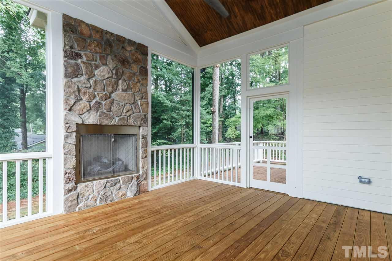 4405 Gates Street Raleigh, NC 27609 - Photo 12 of 18 a view of a balcony with wooden floor