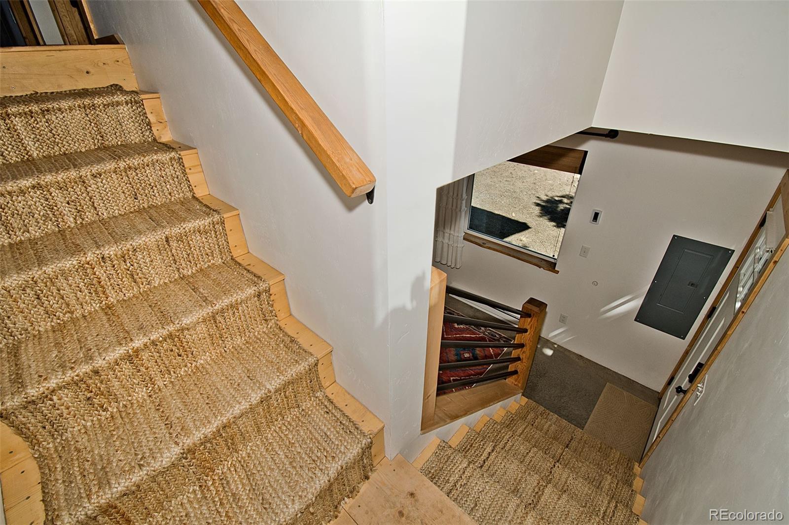 4352 Rarity Way Crestone, CO 81131 - Photo 11 of 49 view of an entryway with staircase