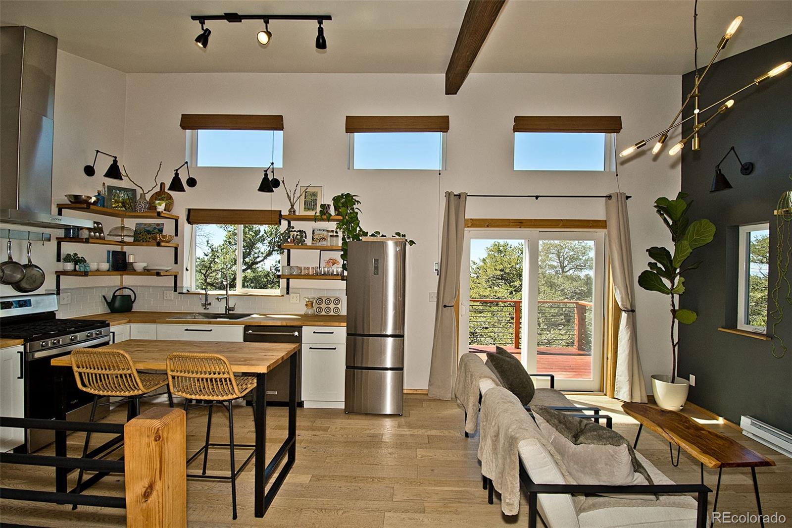 4352 Rarity Way Crestone, CO 81131 - Photo 19 of 49 a view of a dining room with furniture window and outside view