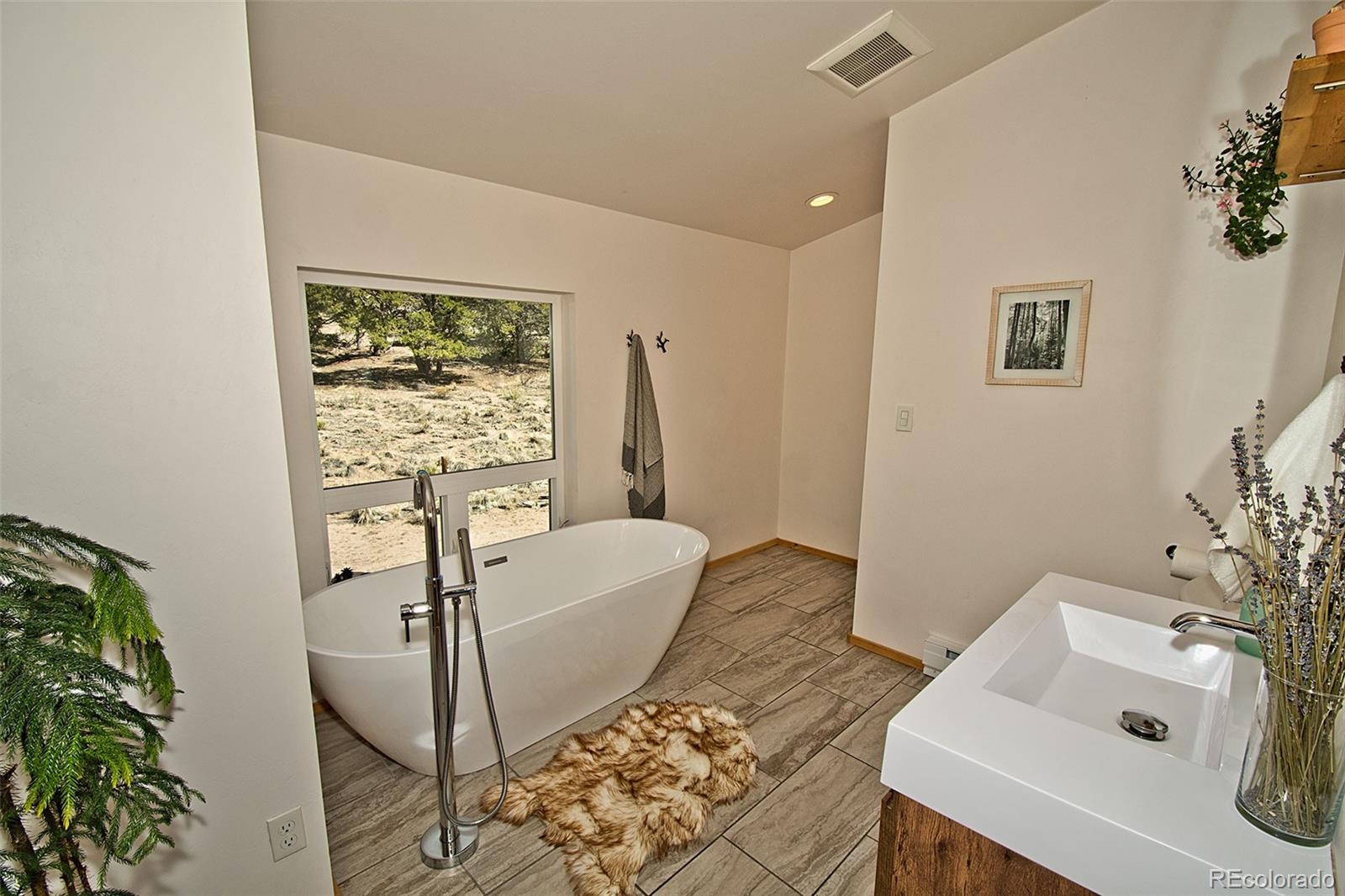 4352 Rarity Way Crestone, CO 81131 - Photo 28 of 49 a living room with furniture and a window