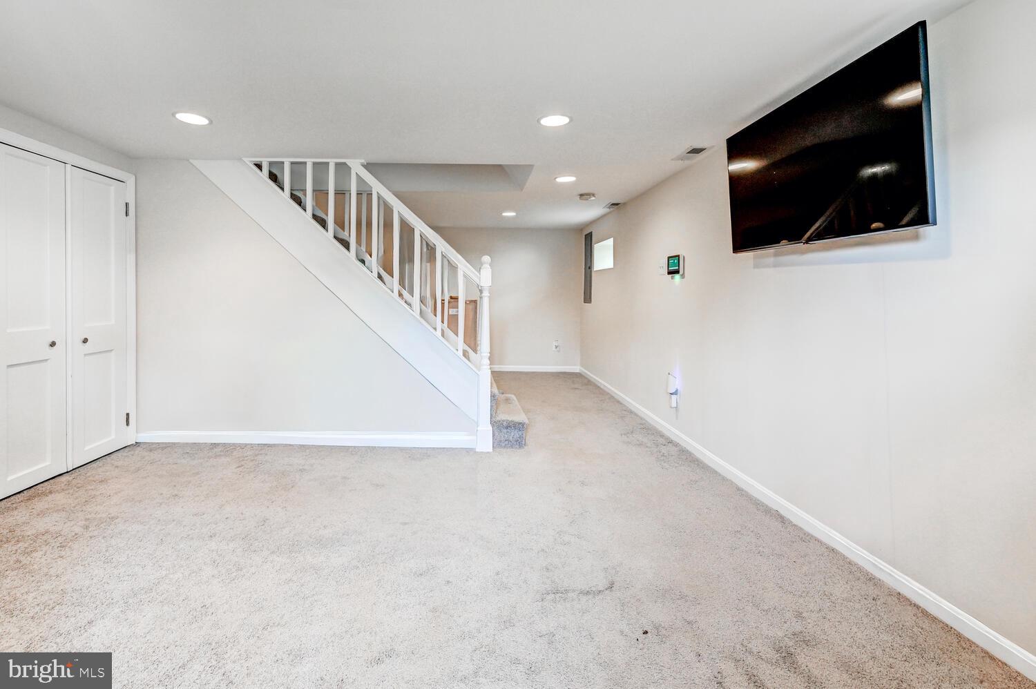 6420 Kenwood Avenue Rosedale, MD 21237 - Photo 16 of 22 a view of a livingroom with a flat screen tv
