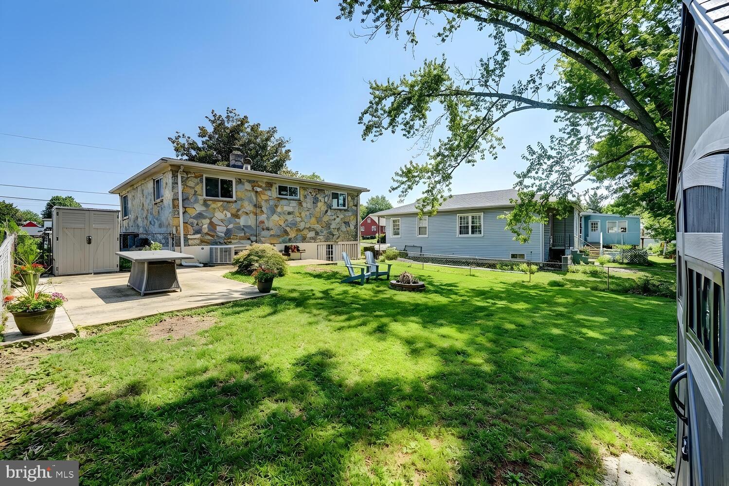 6420 Kenwood Avenue Rosedale, MD 21237 - Photo 21 of 22 a front view of a house with garden