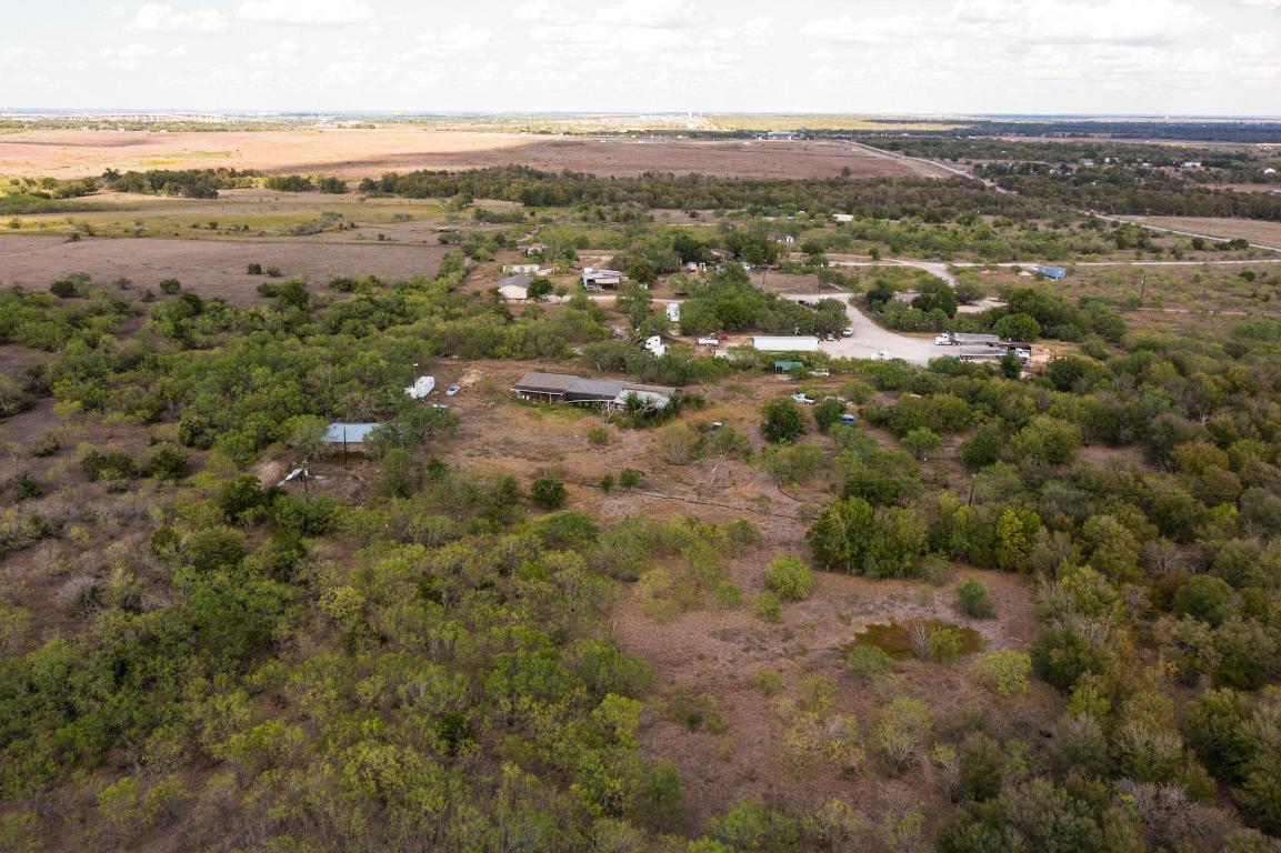 13414 Elm Grove Road Buda, TX 78610 - Photo 17 of 25 an aerial view of residential houses with outdoor space and ocean view