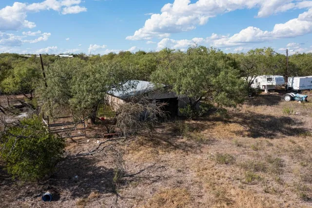 a view of a town with trees around