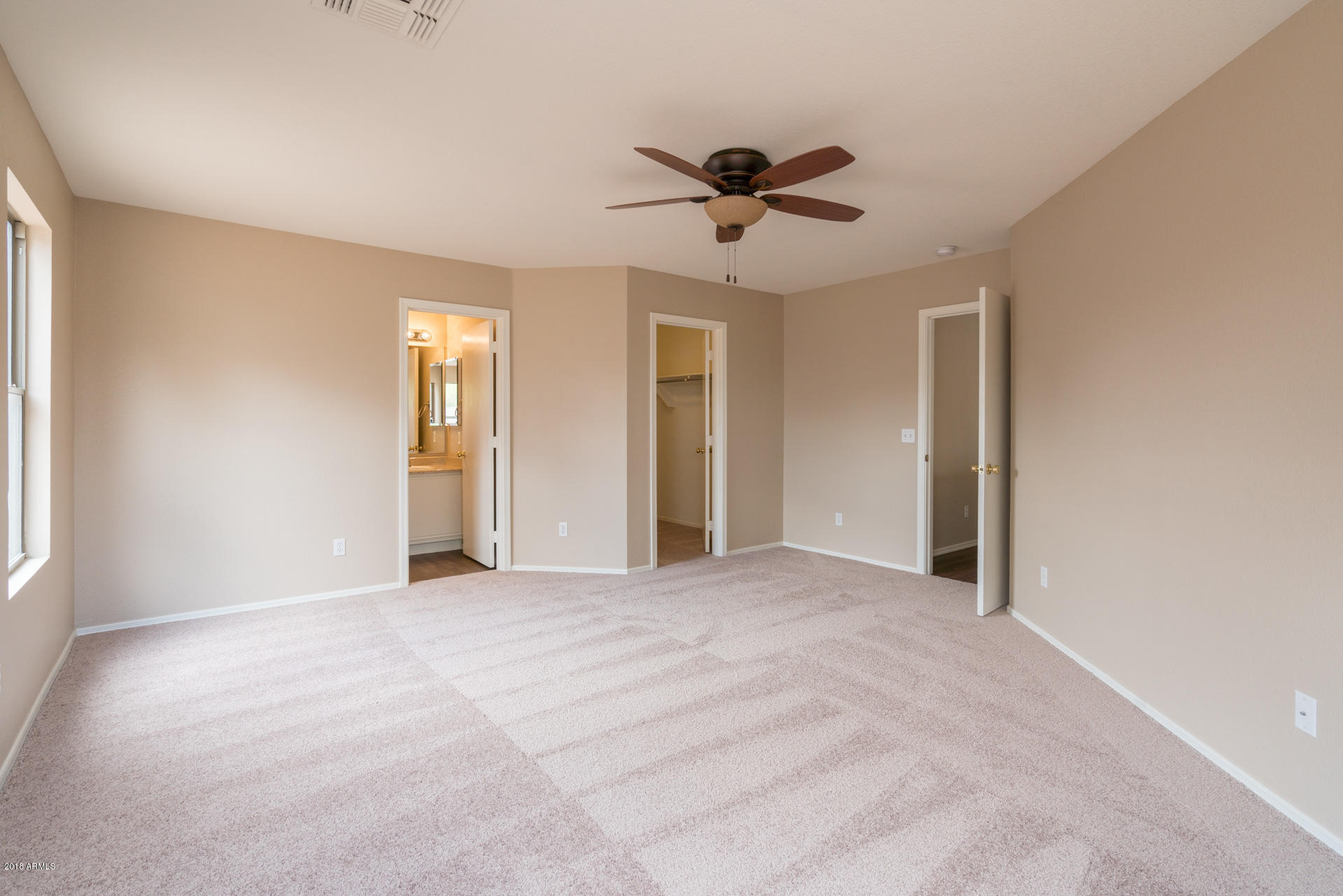 107 South Noble Mesa, AZ 85208 - Photo 12 of 23 a view of a livingroom with a ceiling fan and window