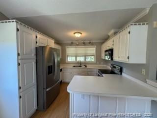 3540 Cornwallis Road Garner, NC 27529 - Photo 7 of 18 a kitchen with refrigerator and window