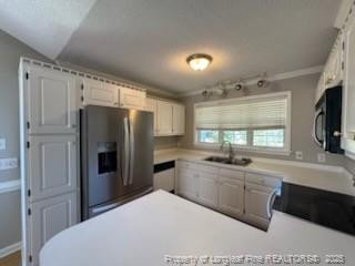 3540 Cornwallis Road Garner, NC 27529 - Photo 9 of 18 a large kitchen with a large window and stainless steel appliances