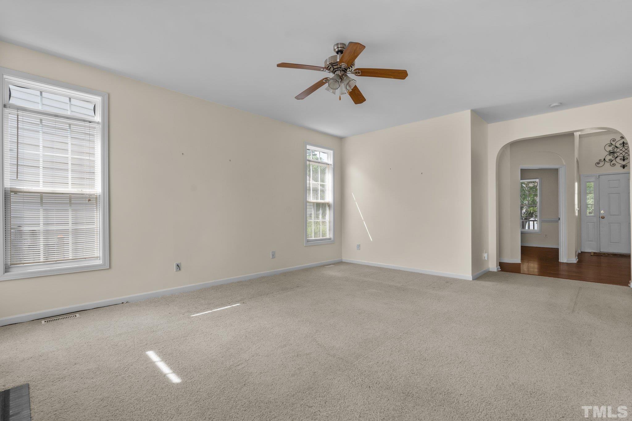 6010 Clarks Fork Drive Raleigh, NC 27616 - Photo 20 of 40 a view of empty room with windows