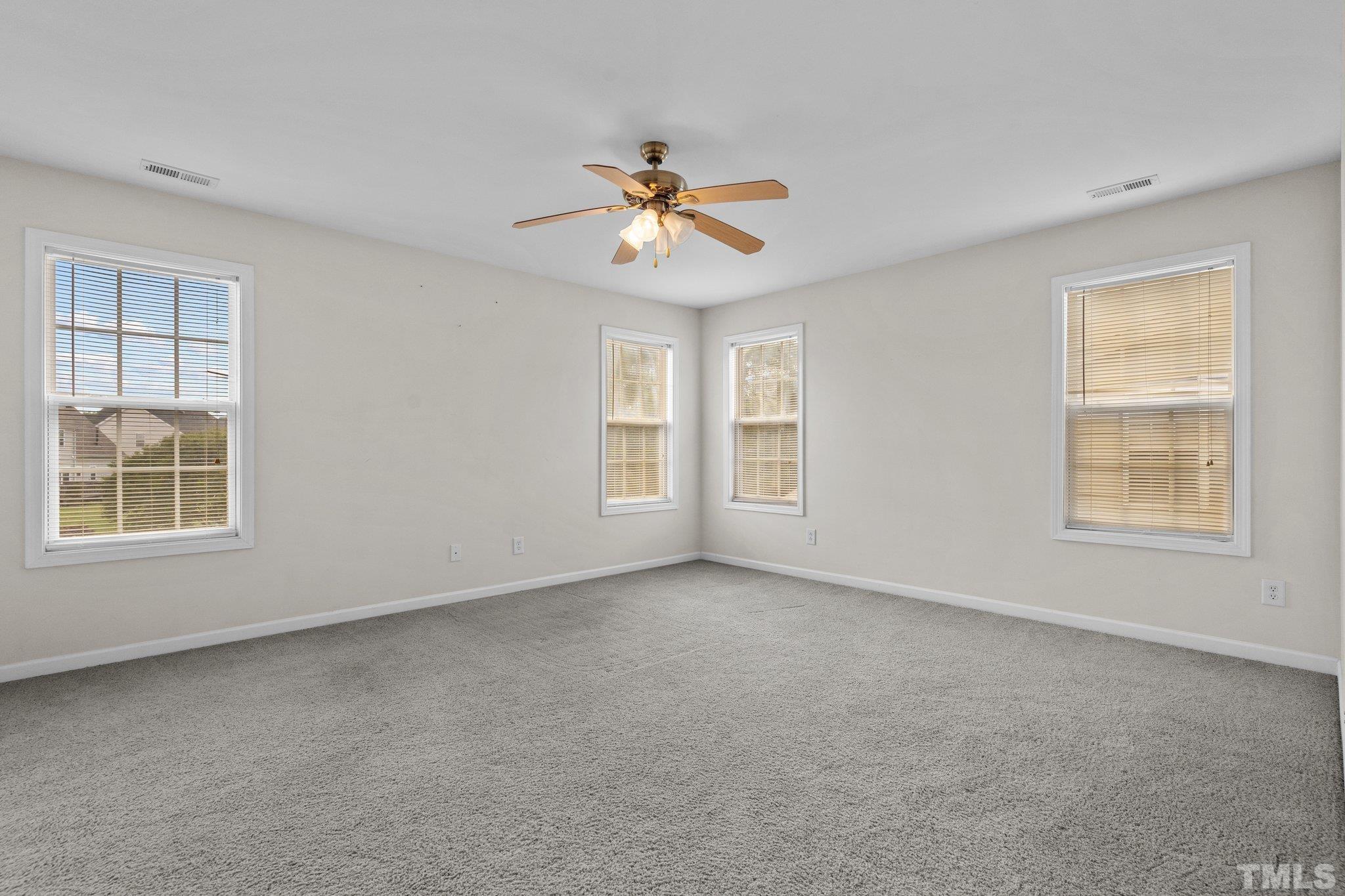 6010 Clarks Fork Drive Raleigh, NC 27616 - Photo 23 of 40 a view of an empty room with a window