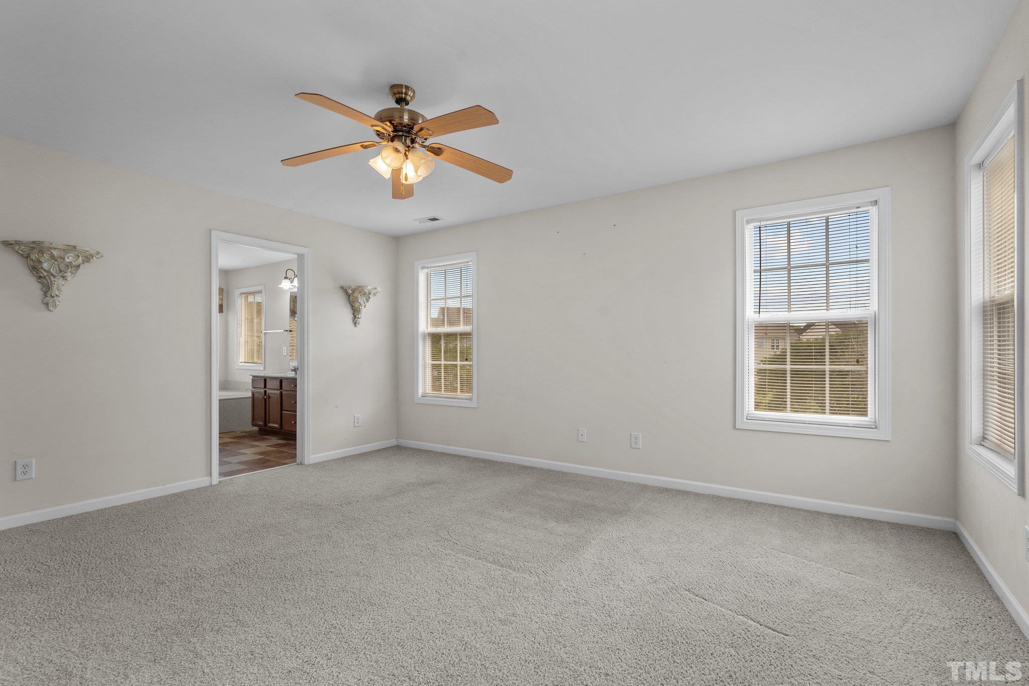 6010 Clarks Fork Drive Raleigh, NC 27616 - Photo 24 of 40 a view of an empty room with a window
