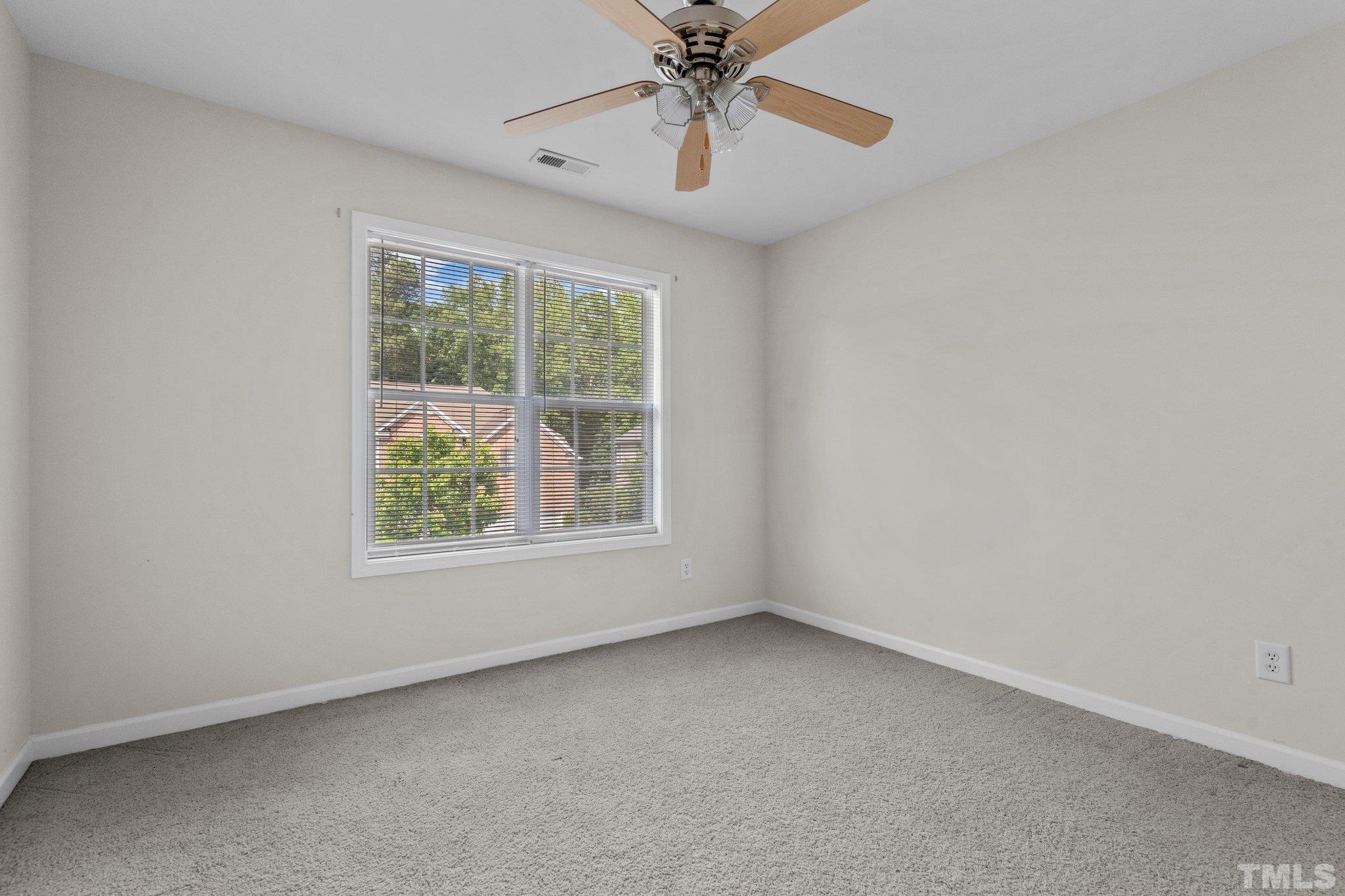 6010 Clarks Fork Drive Raleigh, NC 27616 - Photo 29 of 40 an empty room with a window