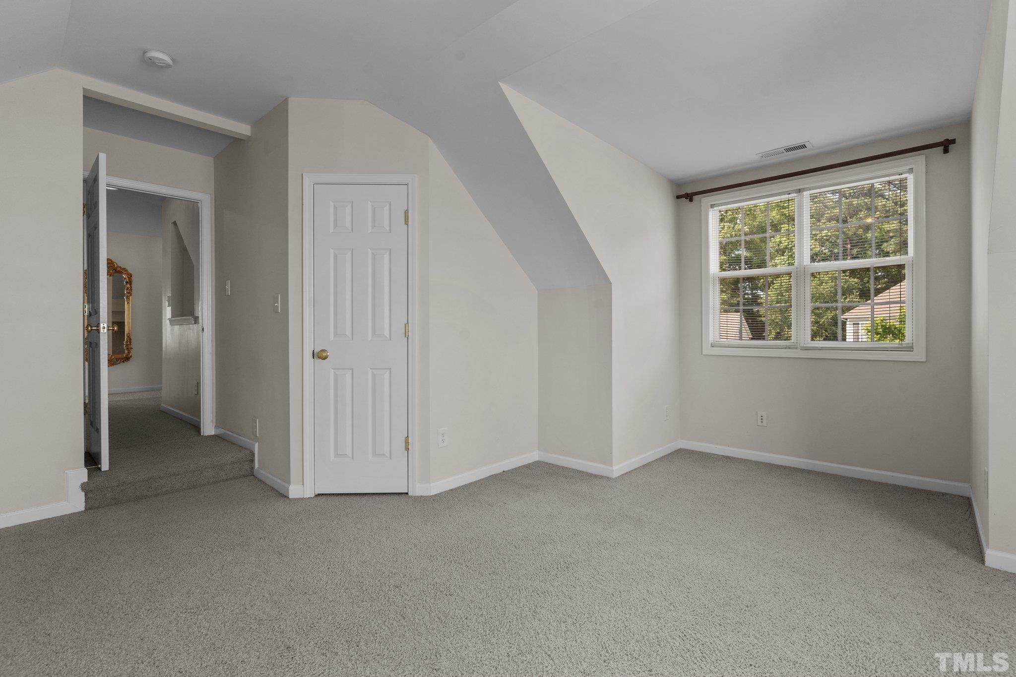 6010 Clarks Fork Drive Raleigh, NC 27616 - Photo 33 of 40 an empty room with a window