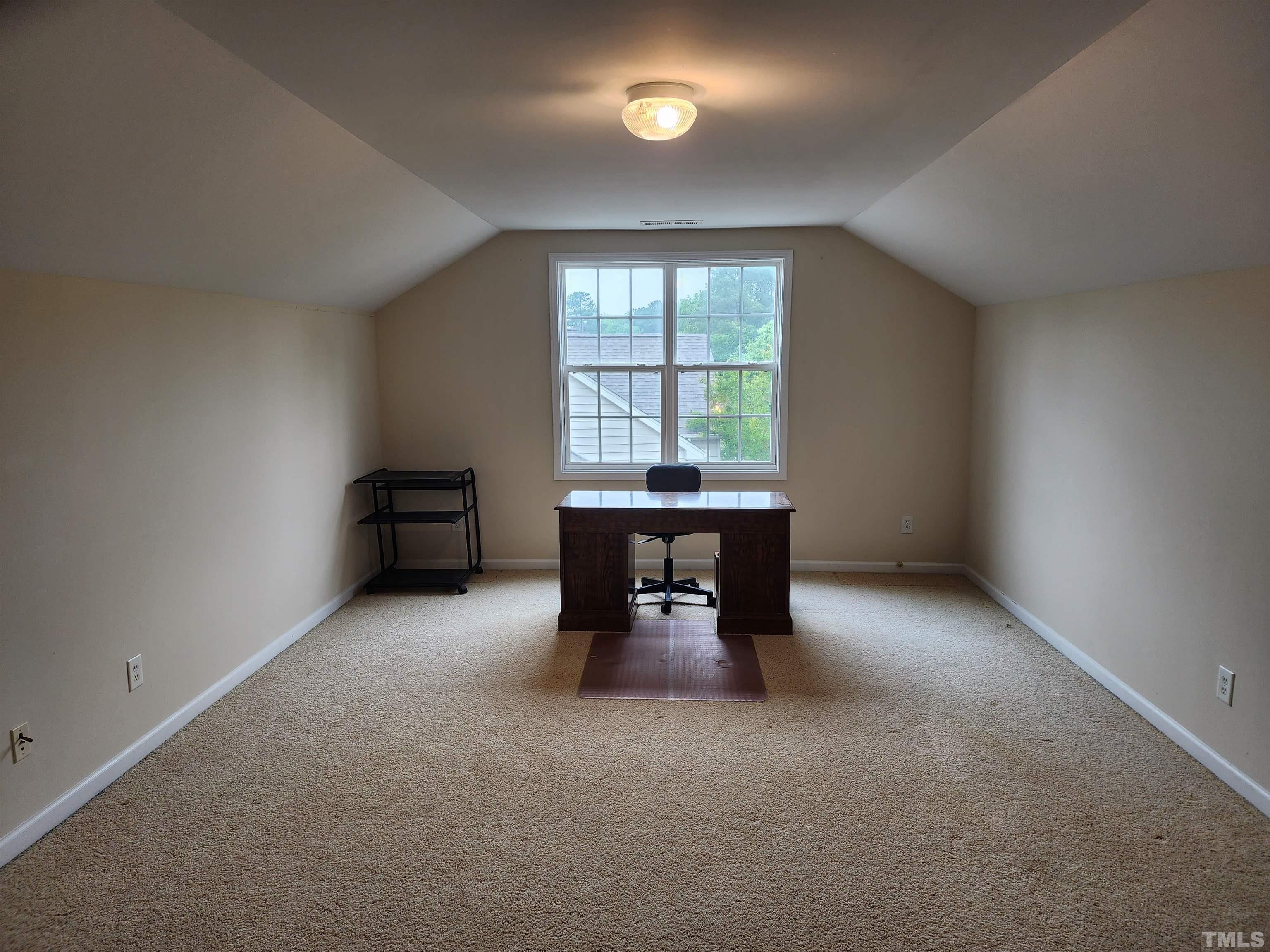 6010 Clarks Fork Drive Raleigh, NC 27616 - Photo 35 of 40 an empty room with a window