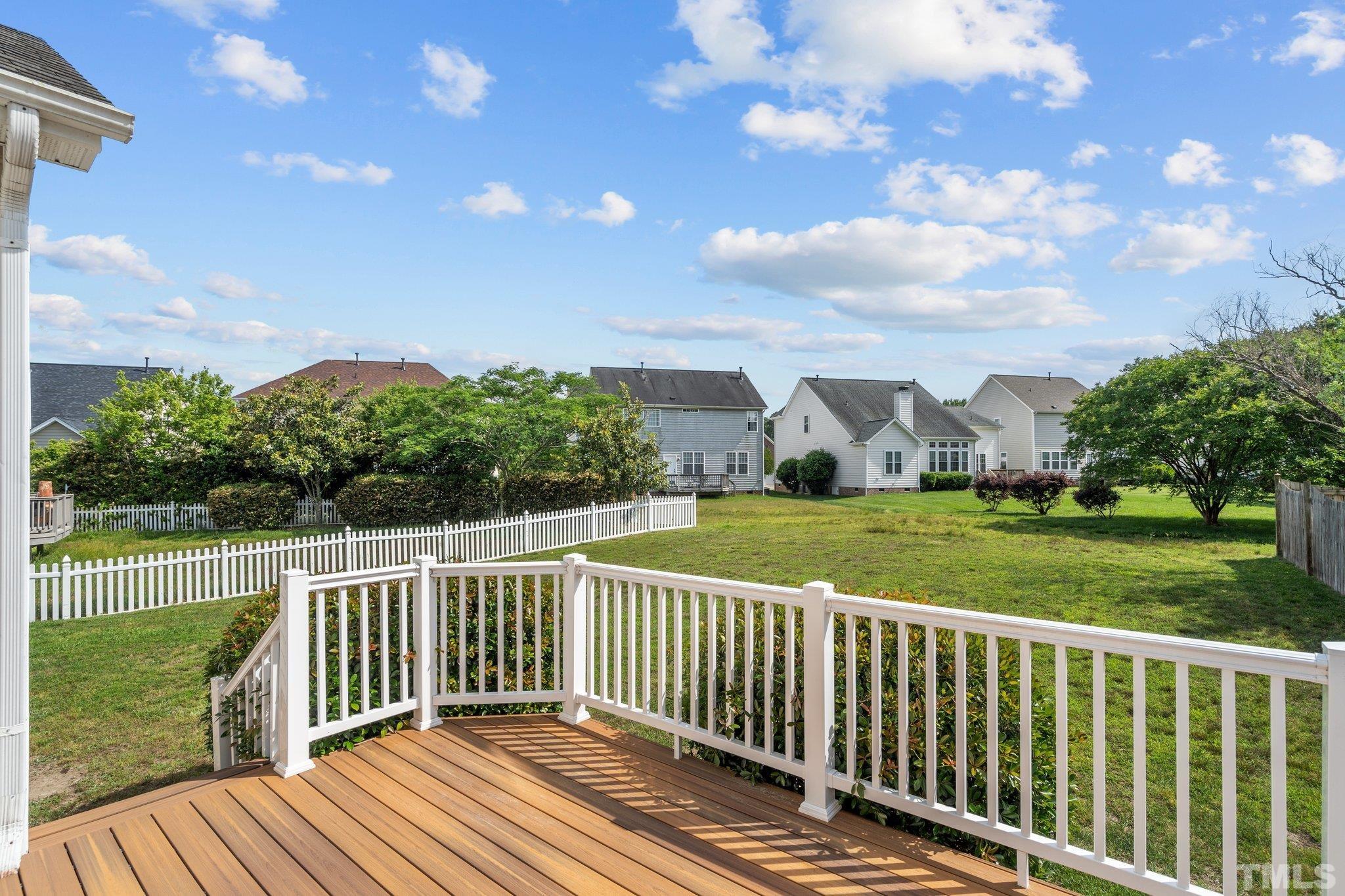 6010 Clarks Fork Drive Raleigh, NC 27616 - Photo 38 of 40 a view of a deck with a big yard