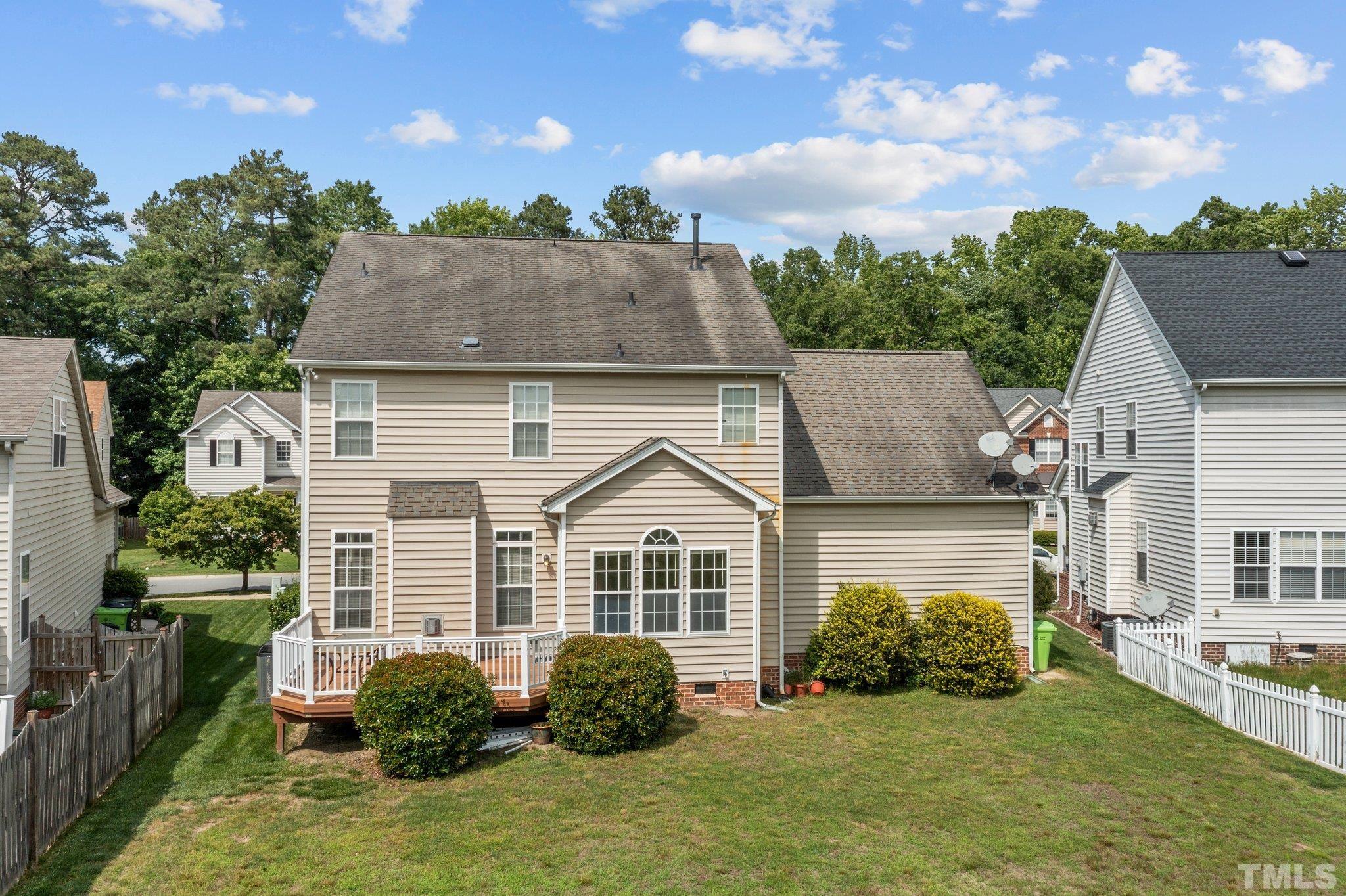 6010 Clarks Fork Drive Raleigh, NC 27616 - Photo 40 of 40 a view of a house with a garden