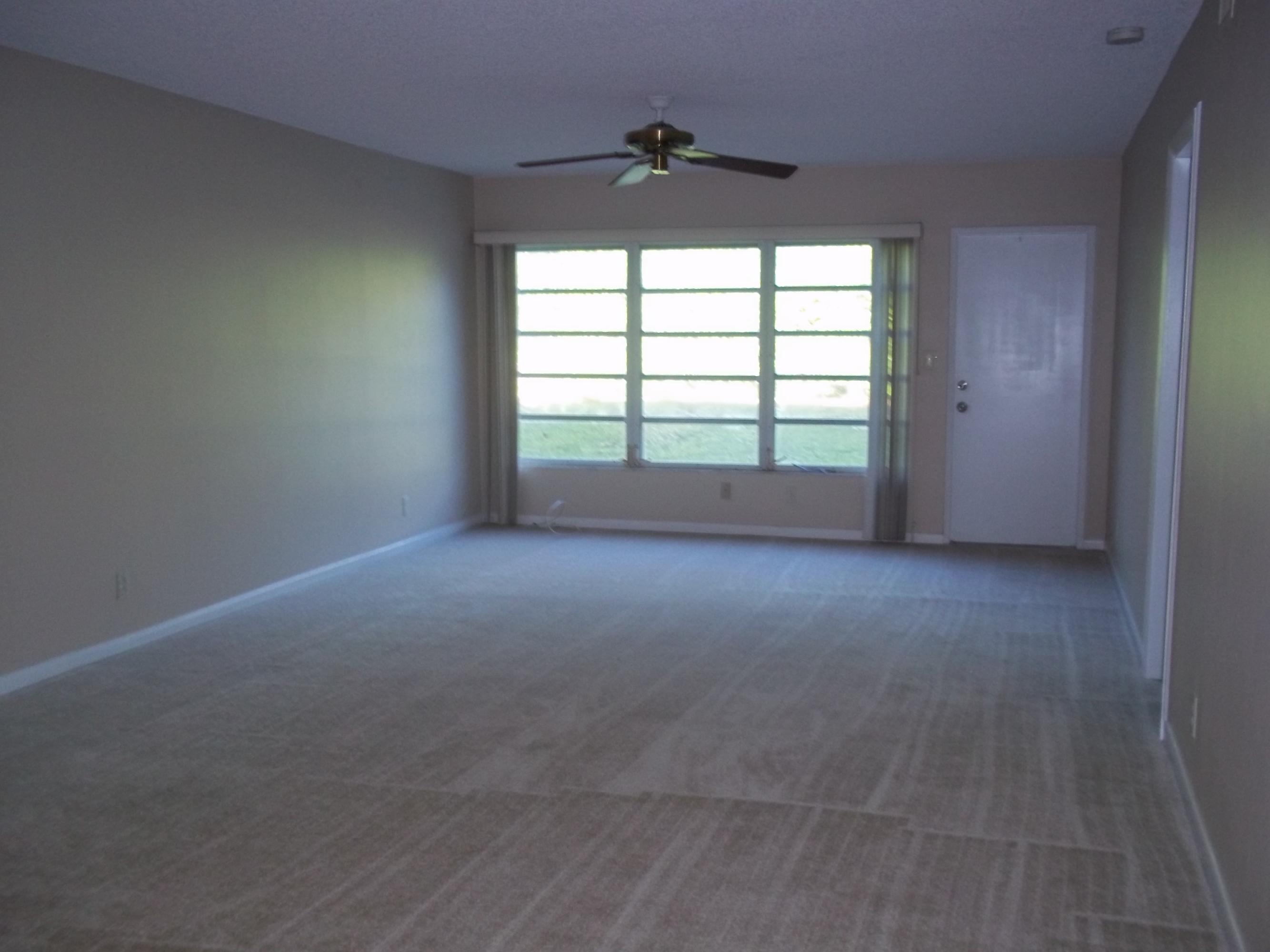 18761 Jolson Avenue, Unit 3 Boca Raton, FL 33496 - Photo 4 of 11 Extended Living Room