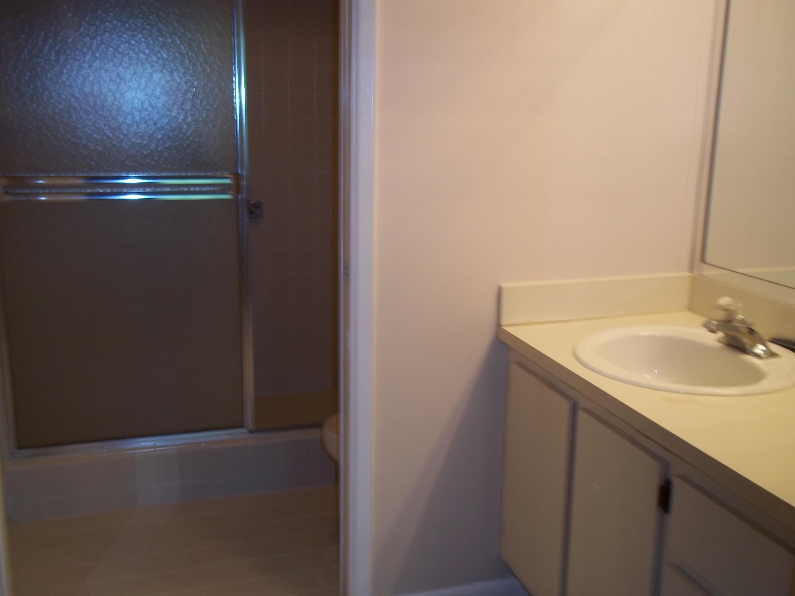 18761 Jolson Avenue, Unit 3 Boca Raton, FL 33496 - Photo 9 of 11 Bathroom, Walk-in Shower
