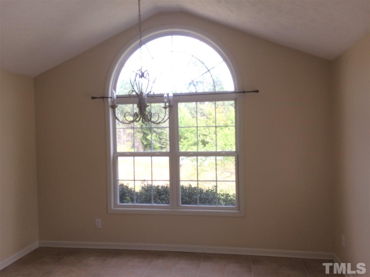 2008 Tingen Road Lillington, NC 27546 - Photo 15 of 25 an empty room with a large window