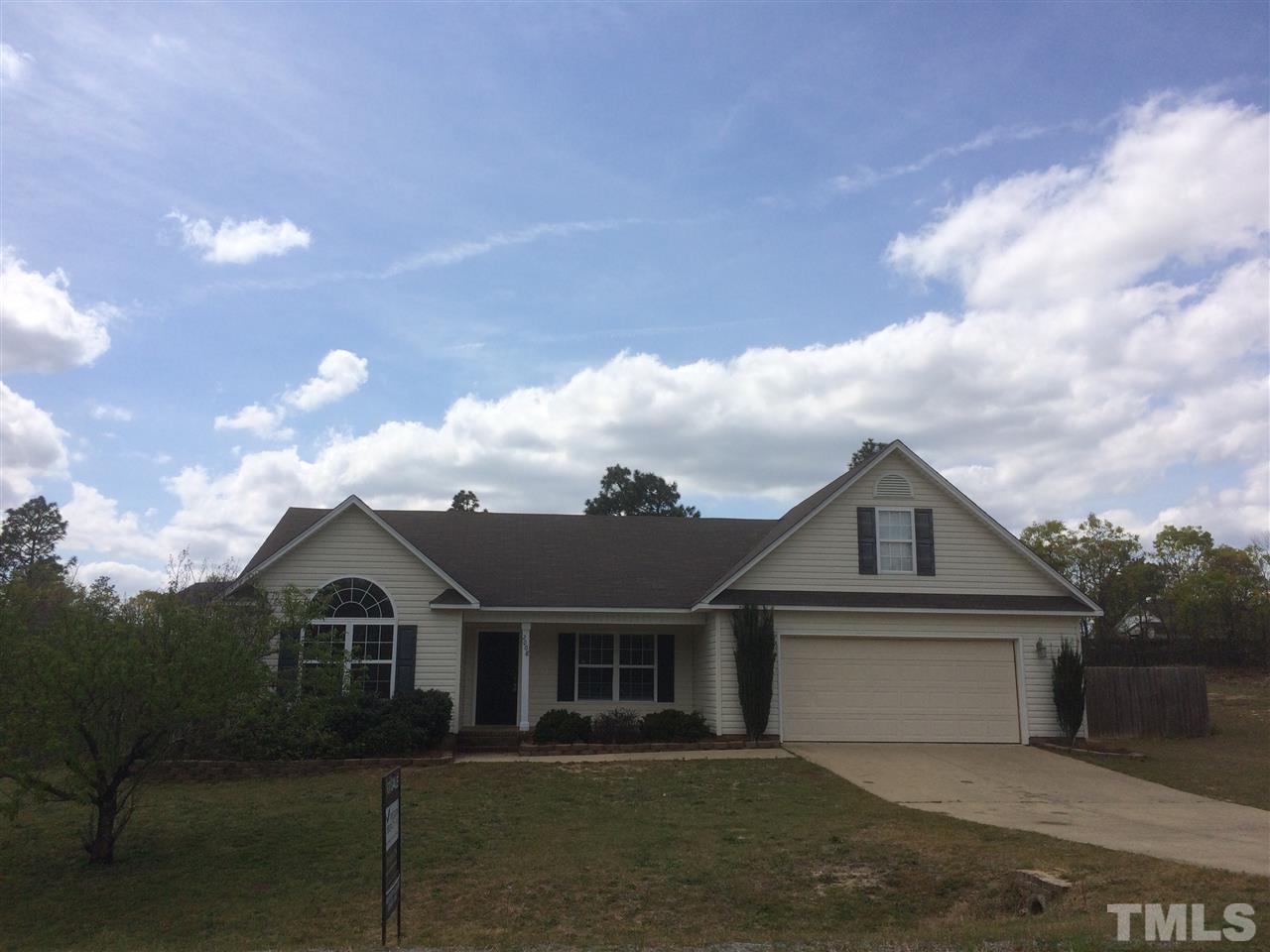 2008 Tingen Road Lillington, NC 27546 - Photo 24 of 25 front view of house with a yard