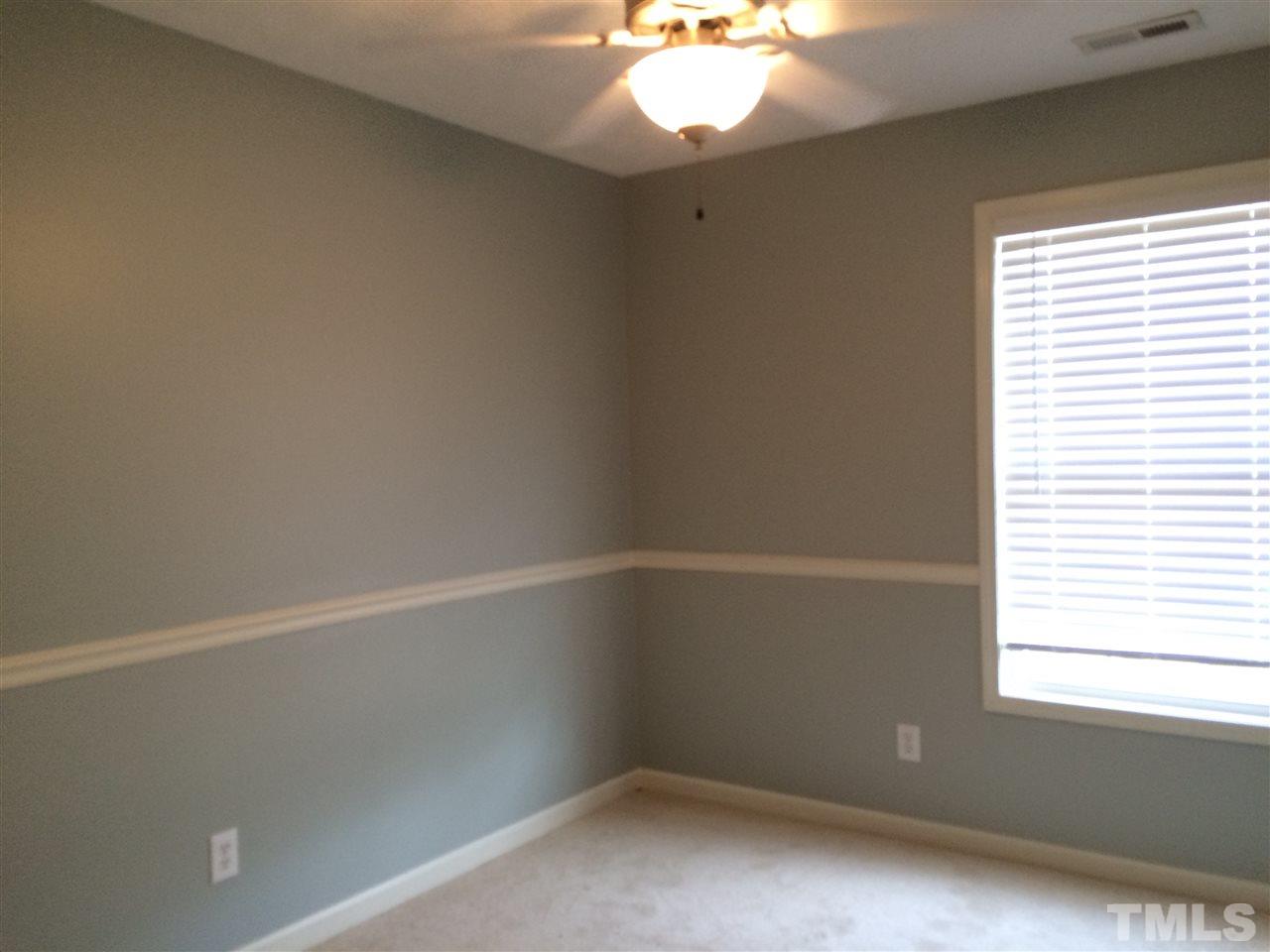 2008 Tingen Road Lillington, NC 27546 - Photo 6 of 25 an empty room with a window