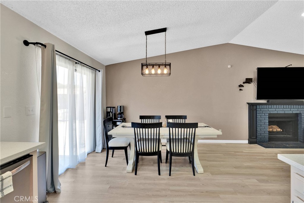 14769 Nanticoke Road Apple Valley, CA 92307 - Photo 8 of 30 a view of a livingroom with furniture and a fireplace