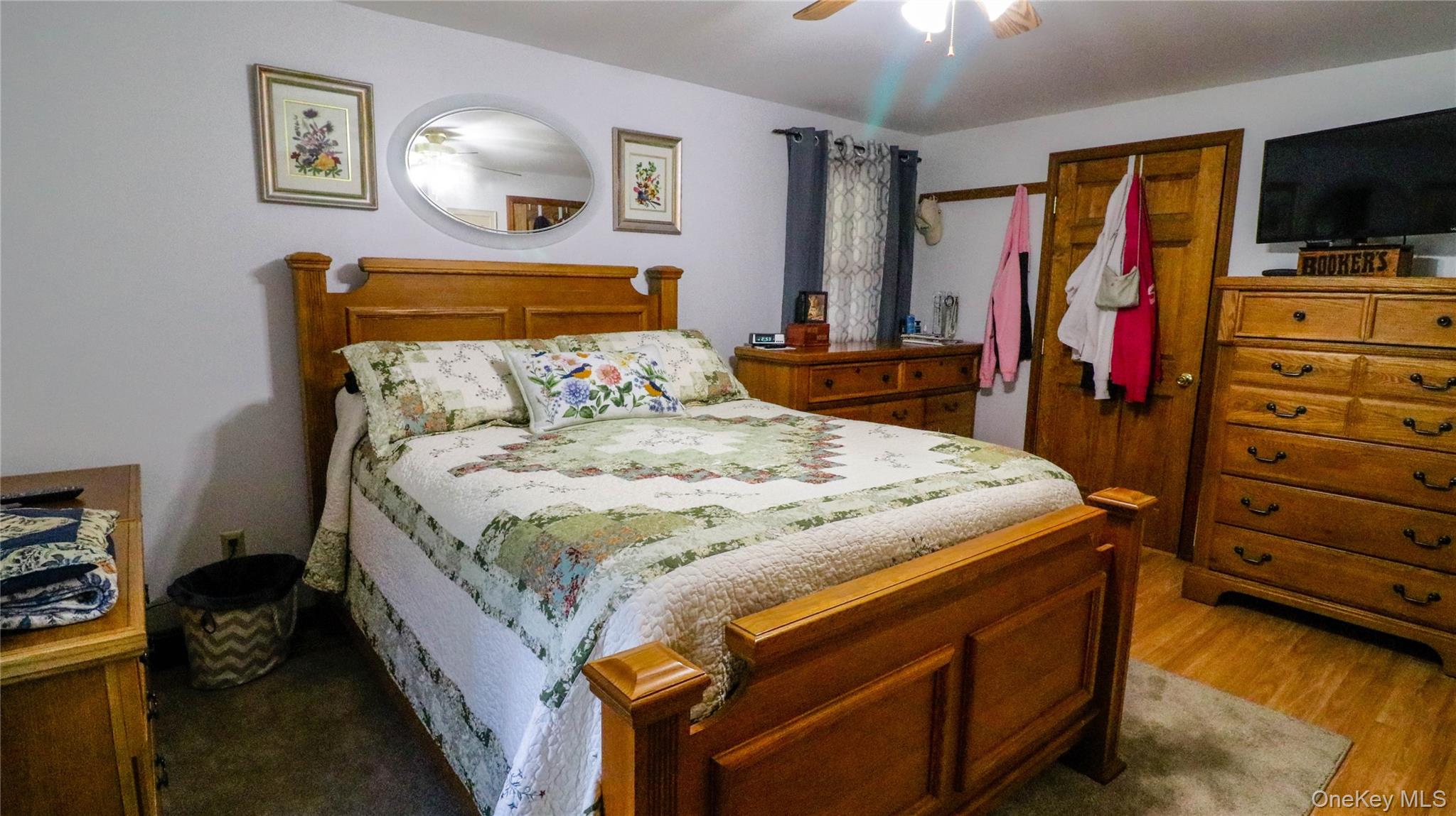 11 Hood Road Roscoe, NY 12776 - Photo 19 of 35 a bedroom with a bed and a tv in it