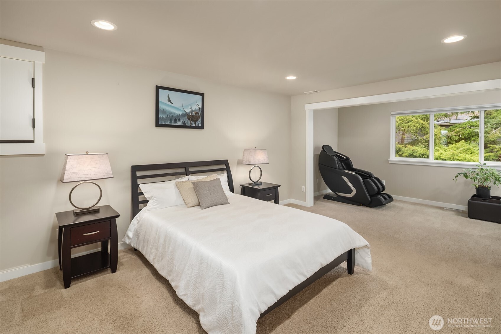 1435 242nd Place Southeast Bothell, WA 98021 - Photo 25 of 40 a bedroom with a bed and a dresser next to a window